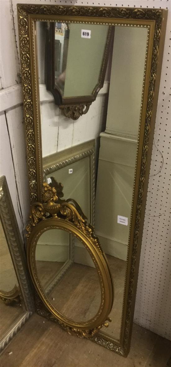 Gilt robing mirror and an oval mirror